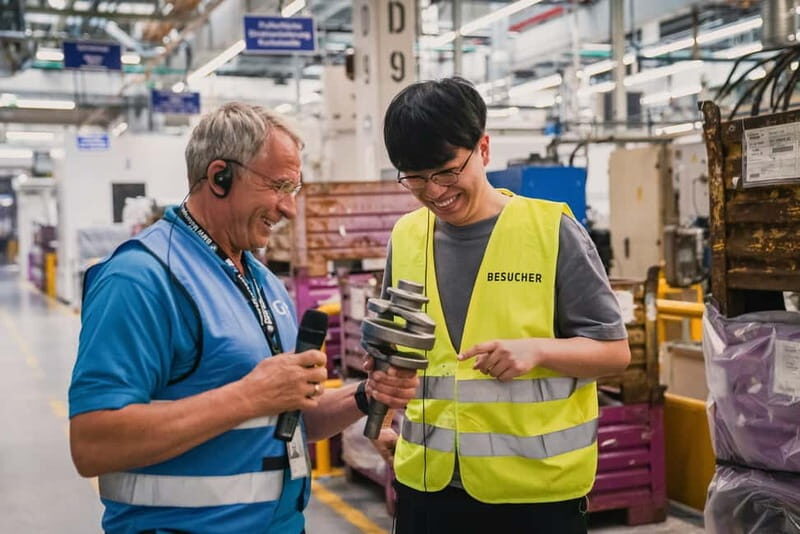Berlin: BMW Motorrad Production – See How Bikes Are Built - Headsets, waistcoats, and the guide factor (including Andreas)