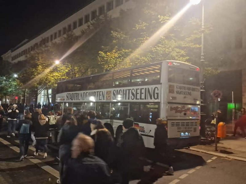 Berlin: Bus Tour by Night with Live Commentary - Riding a Berlin Night Light Show, One Stop at a Time