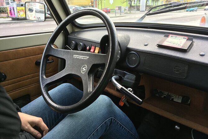 Berlin Self-Drive Trabi Tour with Guide - Communication and driving setup: radio instructions over city noise