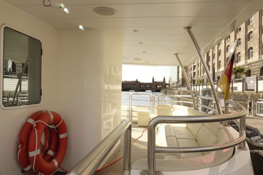 Berlin: Solar Powered Sunset Catamaran Cruise & Audio Guide - Onboard comfort: blankets, cold drinks/snacks, and restroom reality