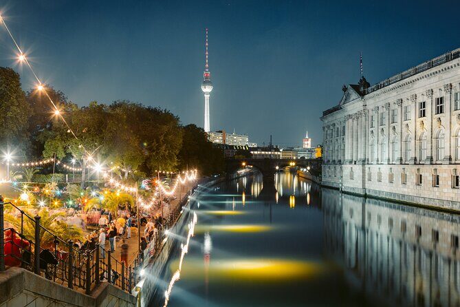 Big Bus Berlin Panoramic Night Tour by Open-Top Bus - Museum Island lit at night and the long sweep of Unter den Linden
