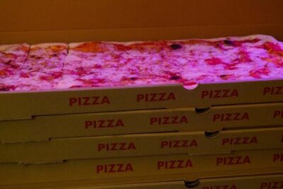 English Comedy Show with Pizza and Shots in Central Berlin - Your evening timeline: doors at 19:00, pizza at 20:15, show at 21:00