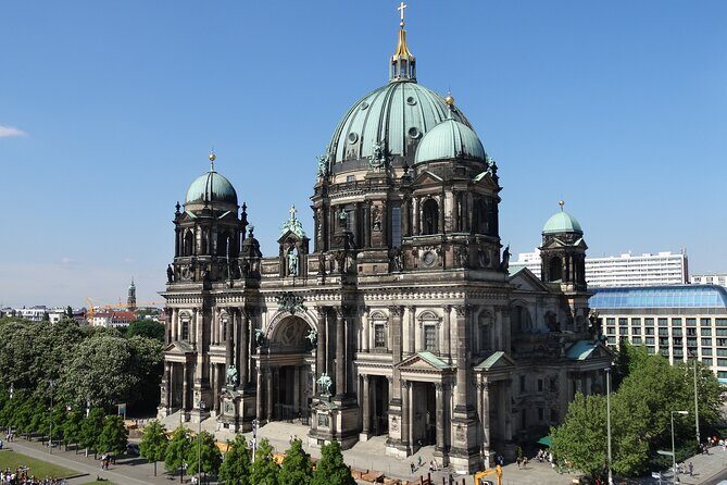Explore Berlin History and Highlights Sightseeing Walking Tour - Reichstag building: from imperial politics to modern attention
