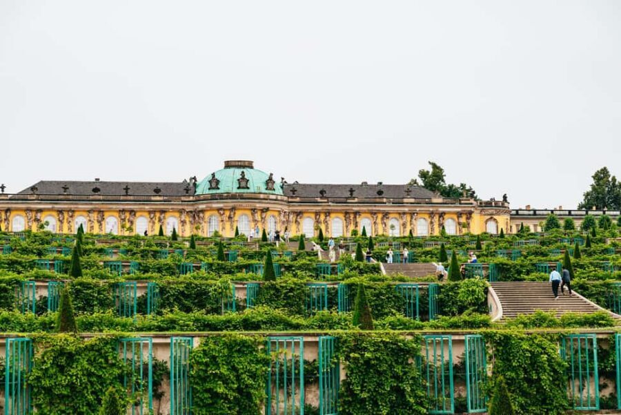 From Berlin: Potsdam and Sanssouci Palace Tour with Entry - The ride into Potsdam: narration plus real neighborhood snapshots